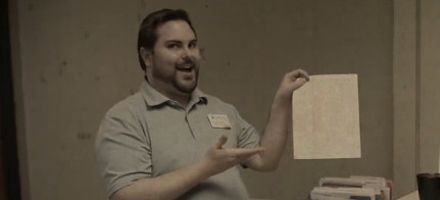Video thumbnail: CCC human resources officer in sepia tone smiling and holding up a form